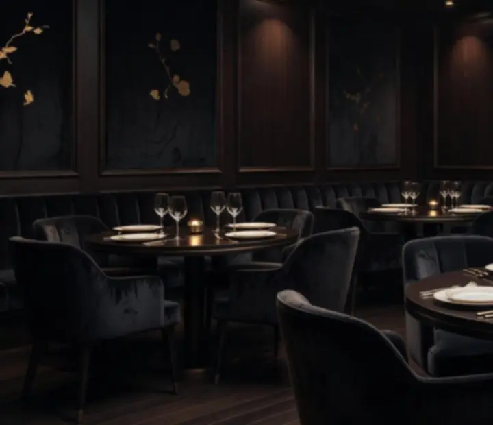 Elegancka restauracja w półmroku z podświetlonym stołem przygotowanym na wieczorne spotkanie